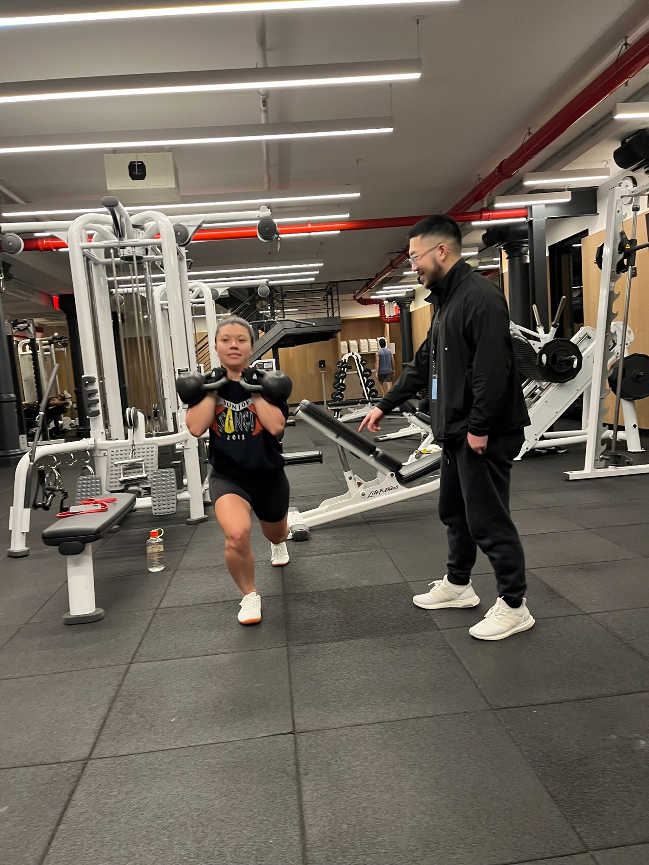 Aaron Fong coaching a client
